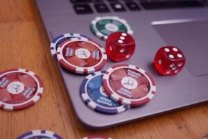 What role do paytables play in determining online slot payout frequency?